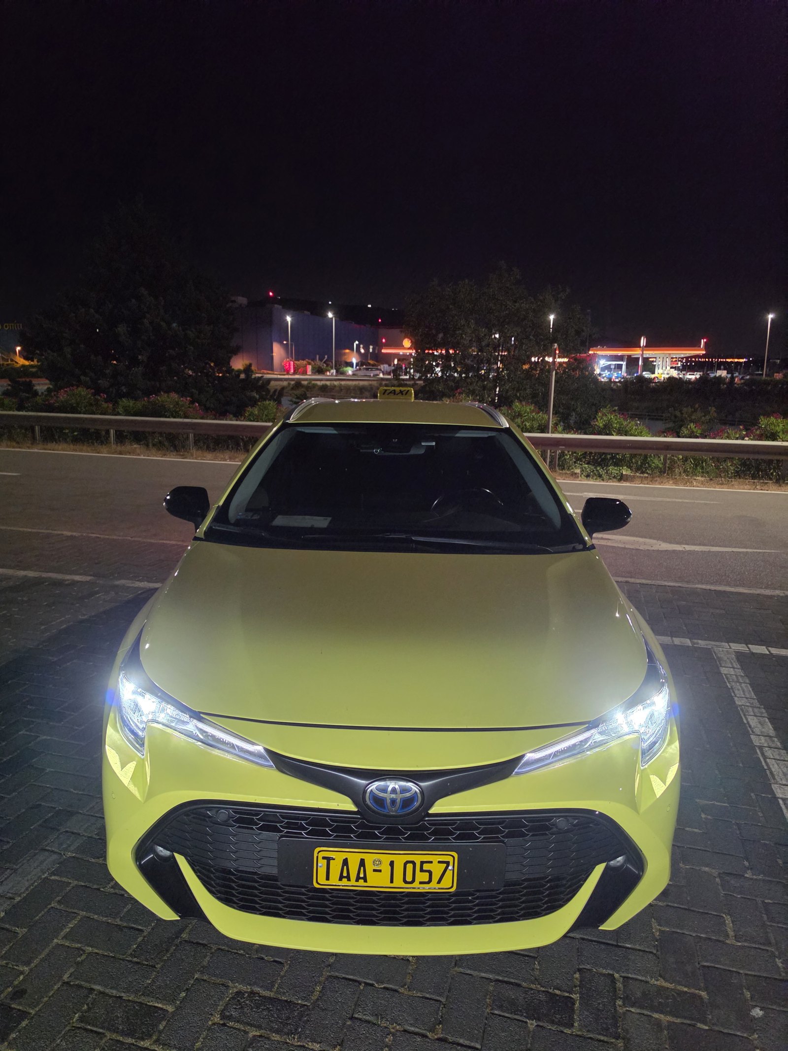 Our yellow Athens taxi at night
